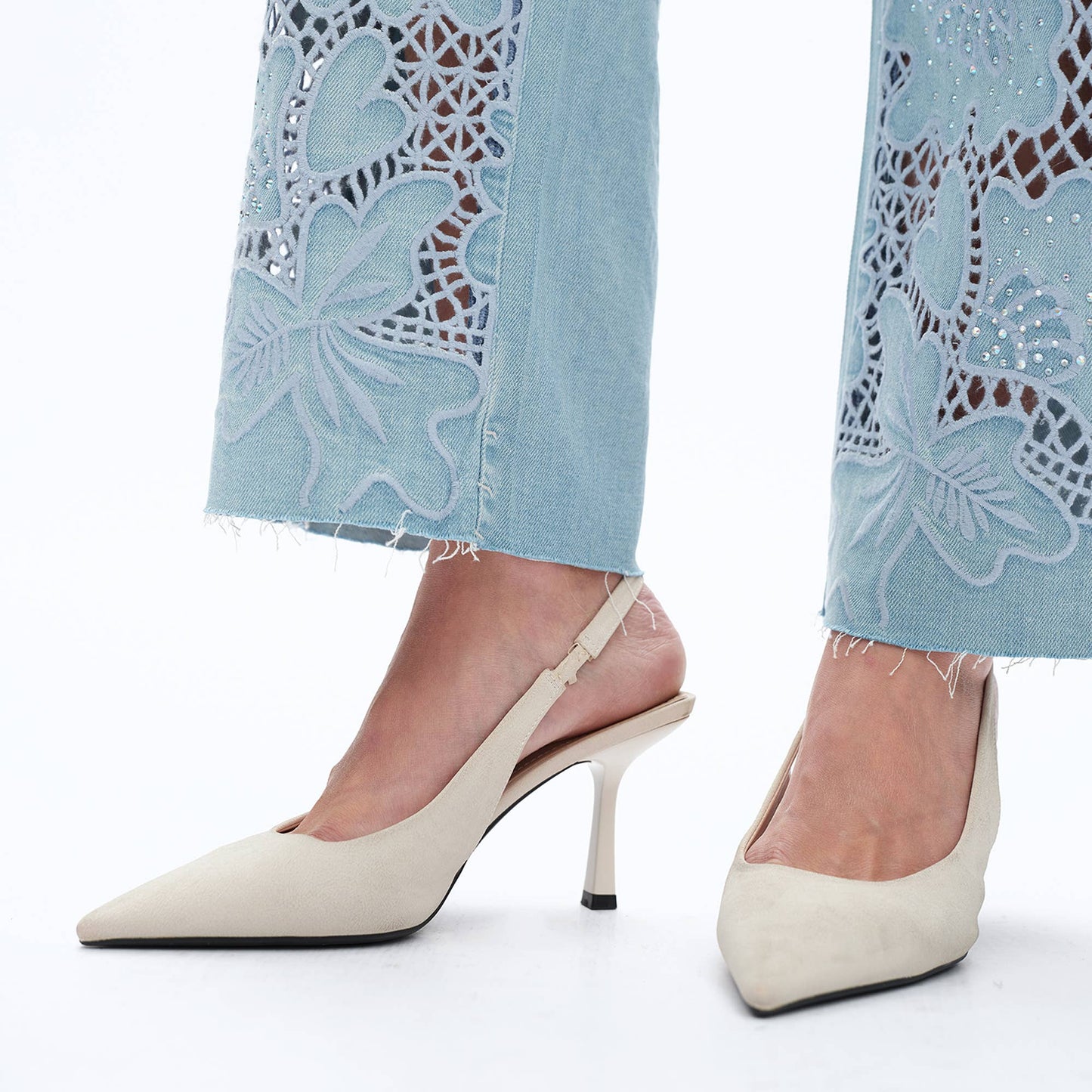 High Rise Embroidered Raw Hem Jeans